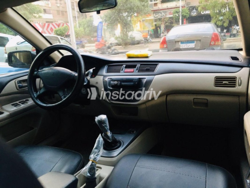 Mitsubishi Lancer 2009 Black Manual Used for Sale in Maadi - 4