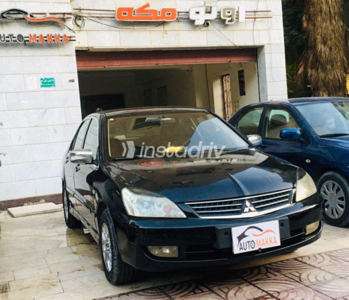 Mitsubishi Lancer 2009 Black Manual Used for Sale in Maadi - 6