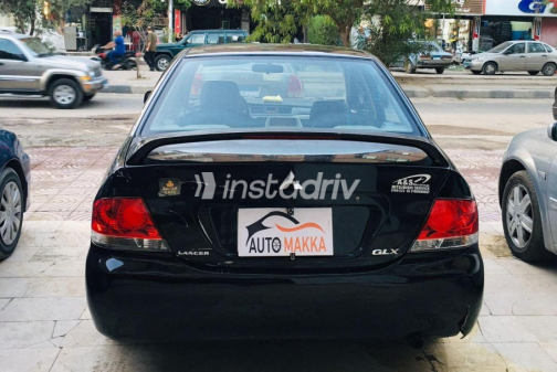 Mitsubishi Lancer 2009 Black Manual Used for Sale in Maadi - 10