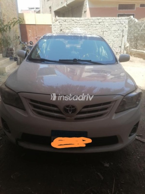 Toyota Corolla 2013 White Automatic Used for Sale in Sohag - 1