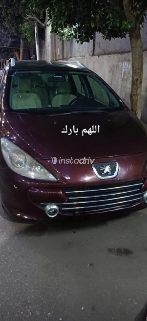 بيجو 207 SW 2007 أحمر غامق أوتوماتيك مستعملة للبيع في القاهرة - 1