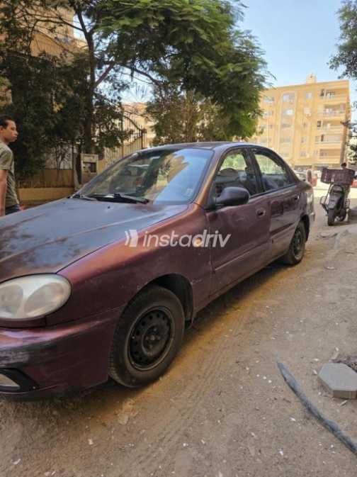 شيفروليه لانوس 2010 أحمر غامق يدوي مستعملة للبيع في الجيزة - 7