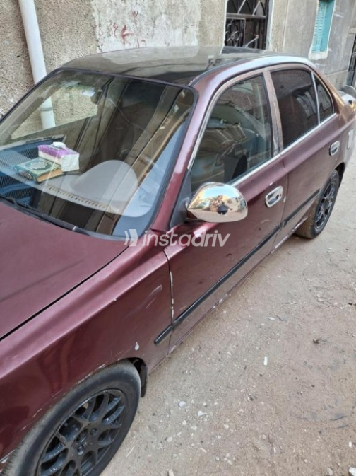 هيونداي فيرنا 2006 أحمر غامق يدوي مستعملة للبيع في أسوان - 4