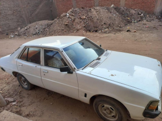 ميتسوبيشي جالانت 1979 أبيض يدوي مستعملة للبيع في الوراق