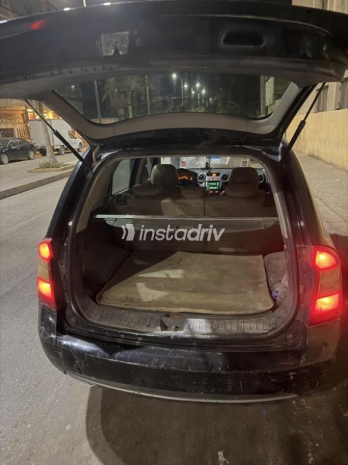 Kia Carens 2011 Black Manual Used for Sale in Banha - 5