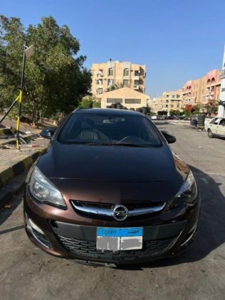 Opel Astra 2016 Eggplant Automatic Used for Sale in Sheikh Zayed City