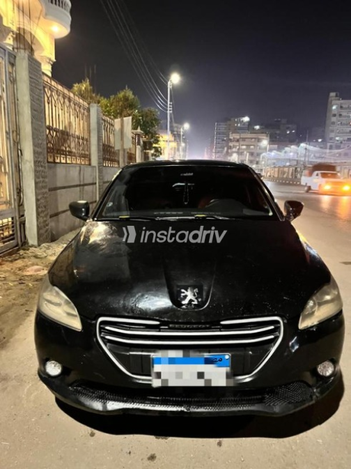 Peugeot 301 2015 Black Manual Used for Sale in Minya Al Qamh - 1