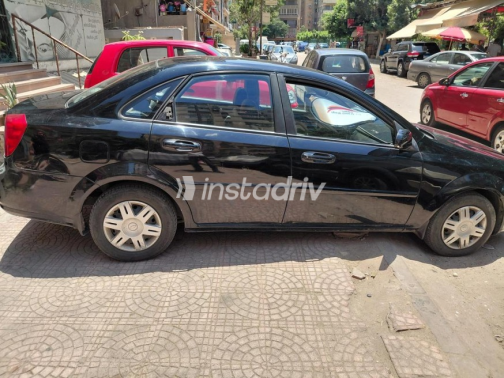 Chevrolet Optra 2010 Black Automatic Used for Sale in Nasr city - 4