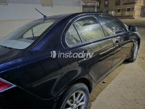 ميتسوبيشي لانسر اى اكس شارك 2015 أسود أوتوماتيك مستعملة للبيع في السويس‎ - 5