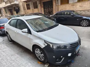 تويوتا كورولا 2015 أبيض CVT مستعملة للبيع في الإسكندرية