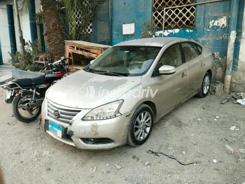 Nissan Sentra 2016 Gold Automatic Used for Sale in Greater Cairo ( Cairo + Giza) - 1