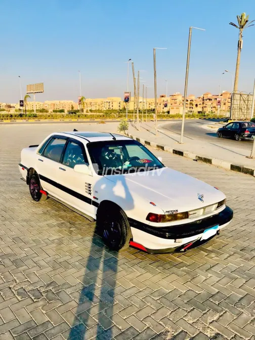 ميتسوبيشي جالانت 1990 أبيض أوتوماتيك مستعملة للبيع في القاهرة الكبرى ( القاهرة - الجيزة) - 4