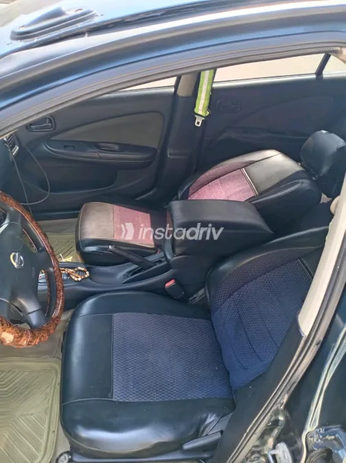 Nissan Sunny 2004 White Automatic Used for Sale in Greater Cairo ( Cairo + Giza) - 1