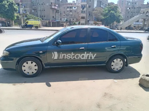 Nissan Sunny 2004 White Automatic Used for Sale in Greater Cairo ( Cairo + Giza) - 5