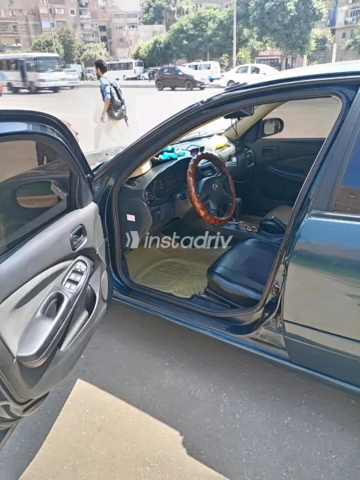 Nissan Sunny 2004 White Automatic Used for Sale in Greater Cairo ( Cairo + Giza) - 6