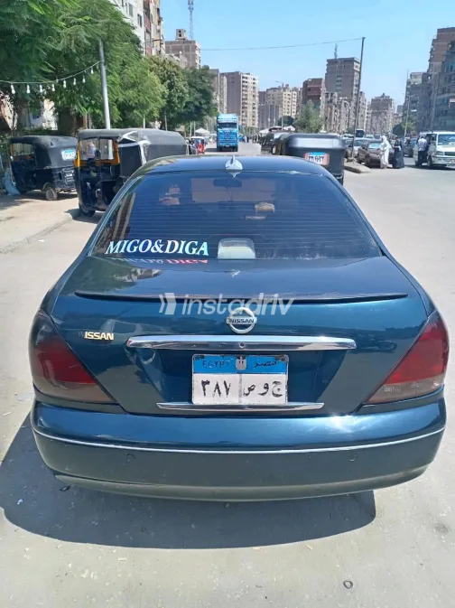 Nissan Sunny 2004 White Automatic Used for Sale in Greater Cairo ( Cairo + Giza) - 8