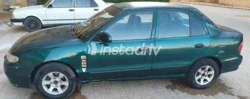 Hyundai Accent 2003 Green Manual Used for Sale in Greater Cairo ( Cairo + Giza) - 3