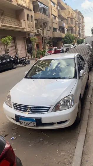 Mitsubishi Lancer Puma 2014 White Automatic Used for Sale in Greater Cairo ( Cairo + Giza)