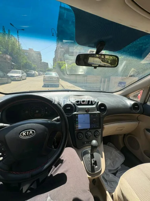 Kia Carens 2010 Bronze Automatic Used for Sale in Greater Cairo ( Cairo + Giza) - 1