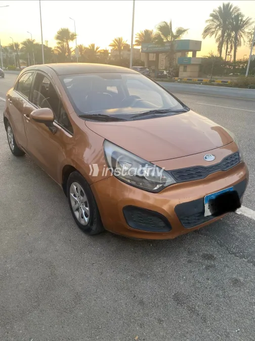 Kia Rio 2013 Orange Automatic Used for Sale in Greater Cairo ( Cairo + Giza) - 5