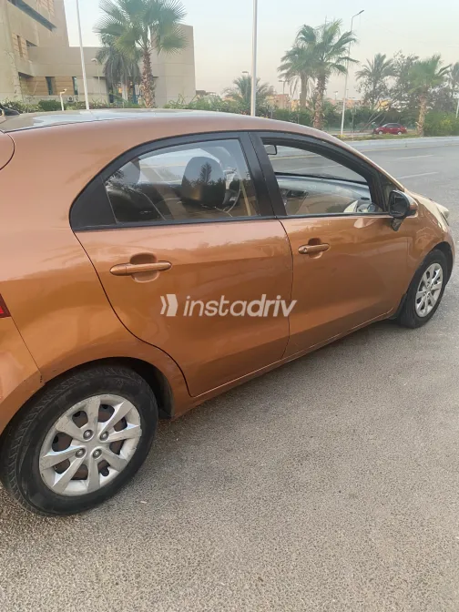 Kia Rio 2013 Orange Automatic Used for Sale in Greater Cairo ( Cairo + Giza) - 8