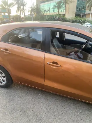 Kia Rio 2013 Orange Automatic Used for Sale in Greater Cairo ( Cairo + Giza)