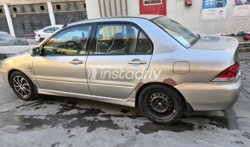 Mitsubishi Lancer Puma 2006 Champagne Automatic Used for Sale in Greater Cairo ( Cairo + Giza) - 6