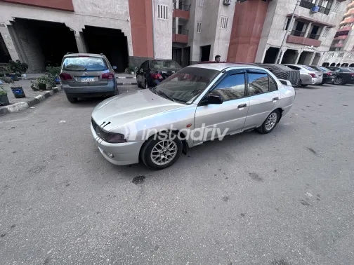 ميتسوبيشي لانسر كرستالة 1999 فضي أوتوماتيك مستعملة للبيع في القاهرة الكبرى ( القاهرة - الجيزة) - 8