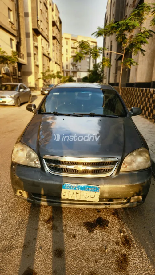 Chevrolet Optra 2012 Gray Manual Used for Sale in Greater Cairo ( Cairo + Giza) - 1