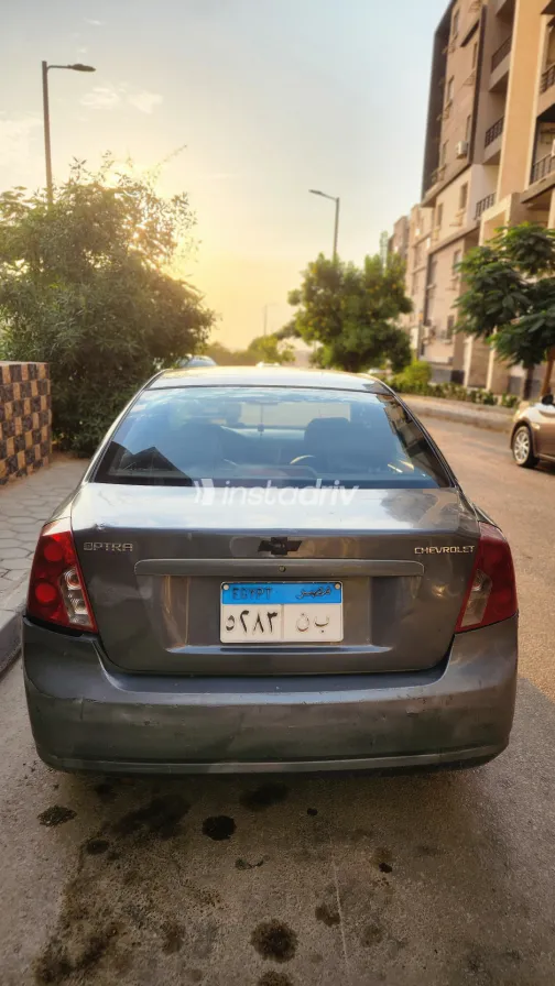 Chevrolet Optra 2012 Gray Manual Used for Sale in Greater Cairo ( Cairo + Giza) - 3