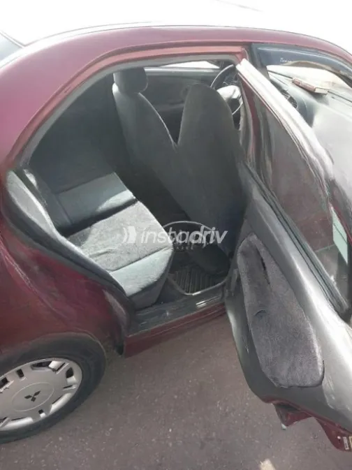 Mitsubishi Lancer Crystala 1998 Dark Red Manual Used for Sale in Giza - 2
