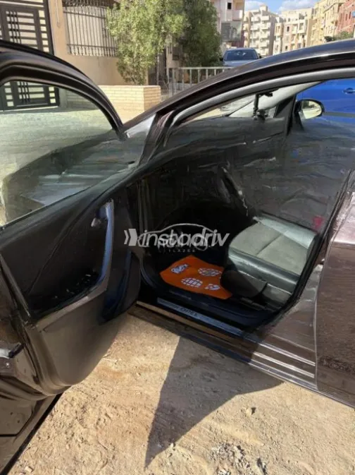 Opel Astra 2014 Eggplant Automatic Used for Sale in Giza - 9