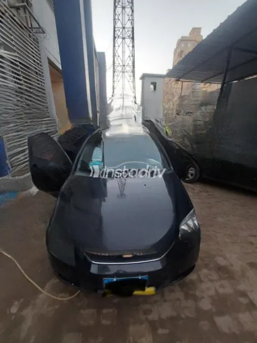 Chevrolet Aveo 2009 Black Manual Used for Sale in Al Shorouk - 1