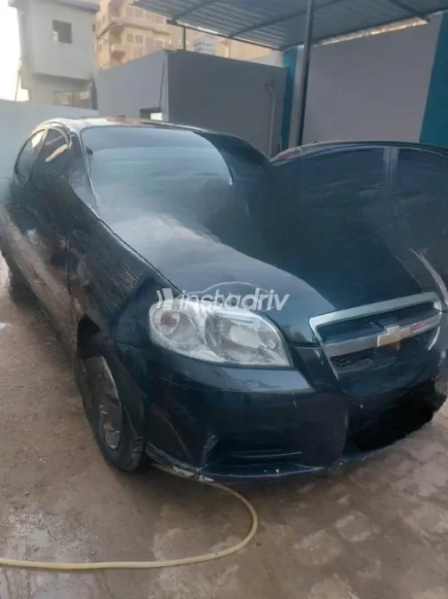 Chevrolet Aveo 2009 Black Manual Used for Sale in Al Shorouk - 2
