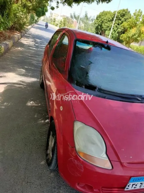Chevrolet Spark 2011 Red Manual Used for Sale in Luxor - 2