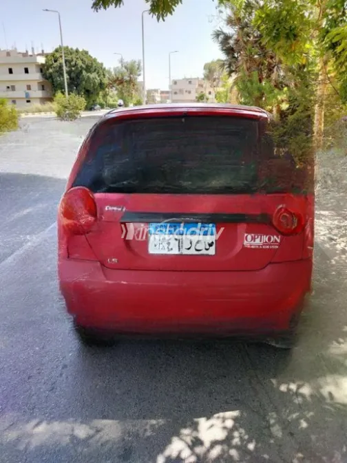 Chevrolet Spark 2011 Red Manual Used for Sale in Luxor - 3