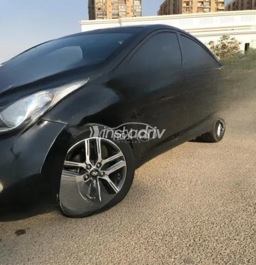 هيونداي إلنترا ام دى 2014 أسود أوتوماتيك مستعملة للبيع في القاهرة - 1