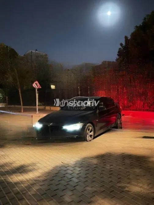 BMW 316 2013 Black Automatic Used for Sale in Sheikh Zayed City - 3