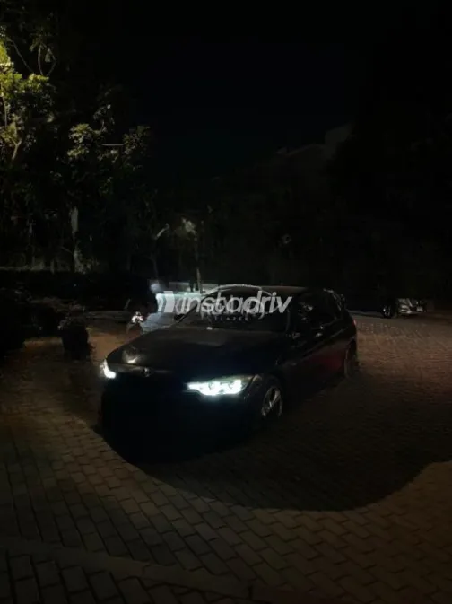 BMW 316 2013 Black Automatic Used for Sale in Sheikh Zayed City - 7
