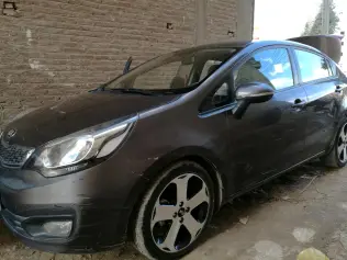 Kia Rio 2013 Bronze Automatic Used for Sale in Greater Cairo ( Cairo + Giza)