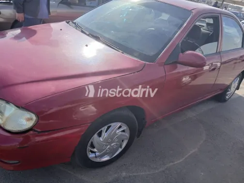 Kia Sephia 1999 Red Manual Used for Sale in Greater Cairo ( Cairo + Giza) - 1