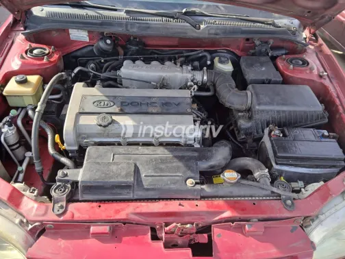 Kia Sephia 1999 Red Manual Used for Sale in Greater Cairo ( Cairo + Giza) - 4