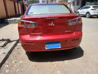 ميتسوبيشي لانسر 2015 أحمر أوتوماتيك مستعملة للبيع في القاهرة الكبرى ( القاهرة - الجيزة)