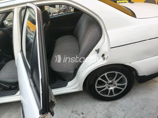 Mitsubishi Mirage 1999 White Manual Used for Sale in Greater Cairo ( Cairo + Giza) - 1