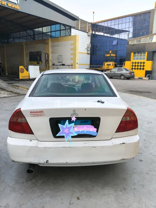 Mitsubishi Mirage 1999 White Manual Used for Sale in Greater Cairo ( Cairo + Giza) - 3