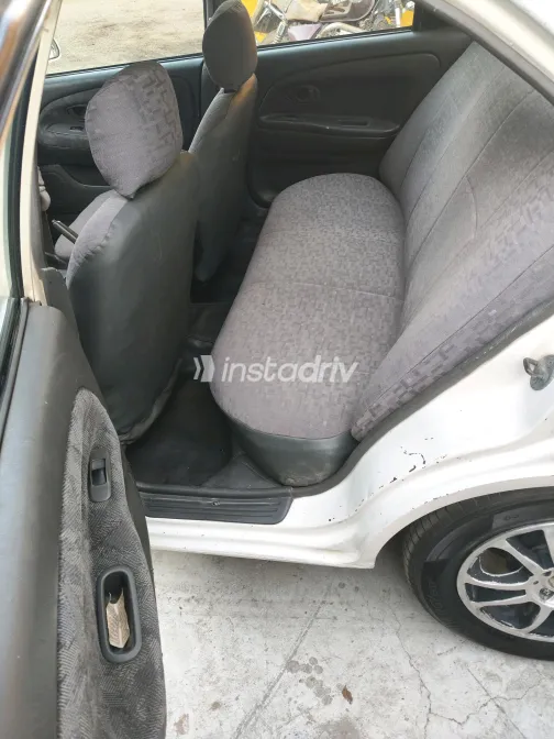 Mitsubishi Mirage 1999 White Manual Used for Sale in Greater Cairo ( Cairo + Giza) - 6
