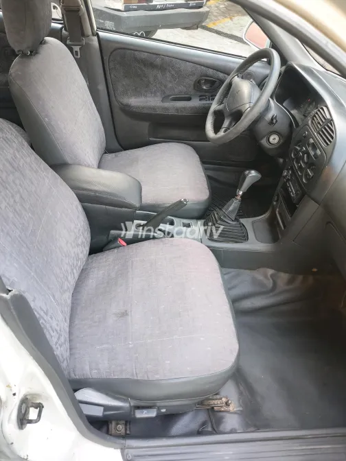 Mitsubishi Mirage 1999 White Manual Used for Sale in Greater Cairo ( Cairo + Giza) - 9