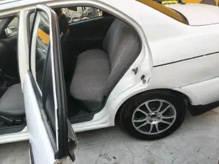 Mitsubishi Mirage 1999 White Manual Used for Sale in Greater Cairo ( Cairo + Giza)