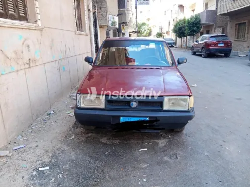 فيات شاهين 2004 أحمر غامق يدوي مستعملة للبيع في الجيزة - 1