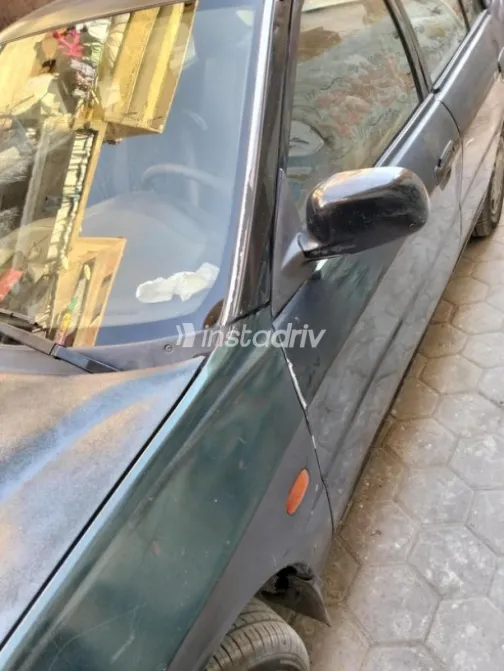 Mitsubishi Lancer Crystala 1998 Green Manual Used for Sale in Cairo - 4